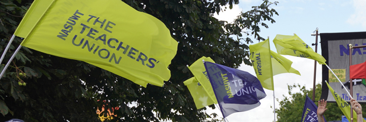NASUWT green and blue flags against trees and sky BANNER.jpg