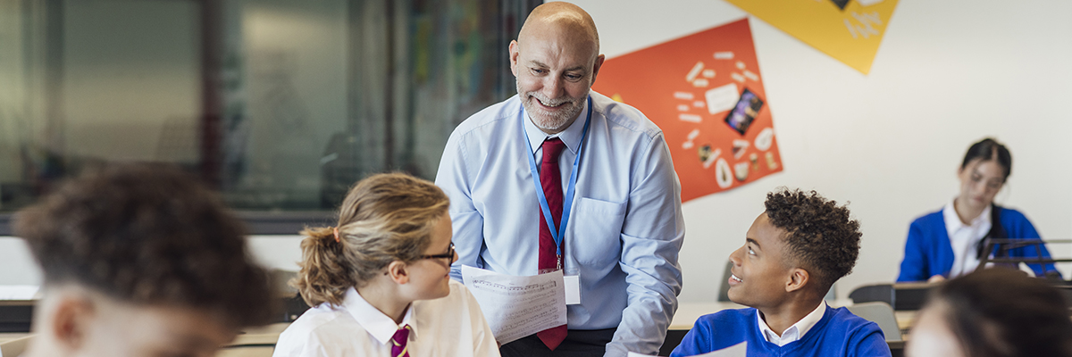 Asian male teacher mixed secondary pupils FEATURE PANEL