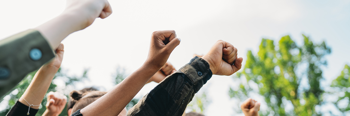 Strike arms raised mixed BANNER.jpg