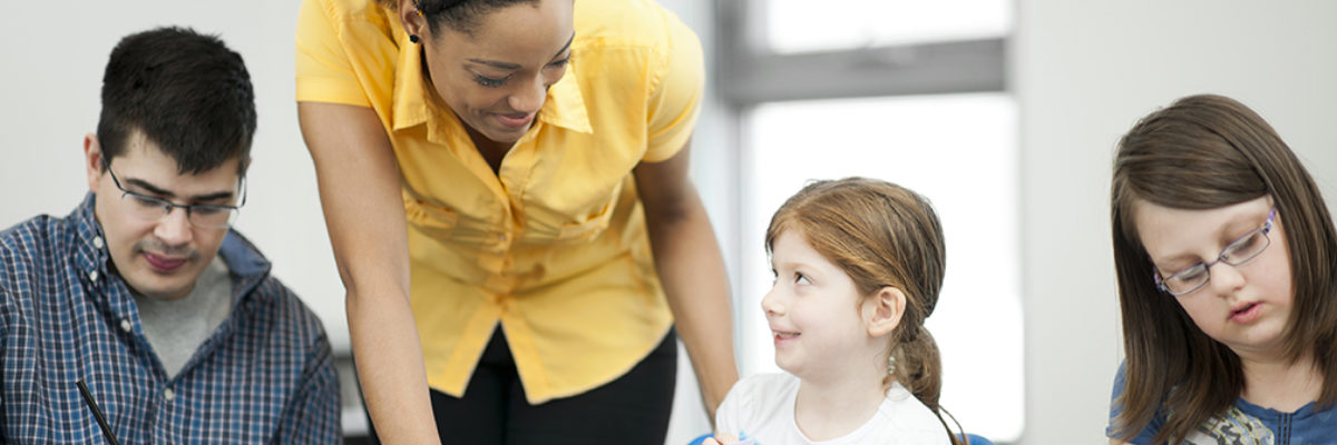 Black female teacher special needs pupils