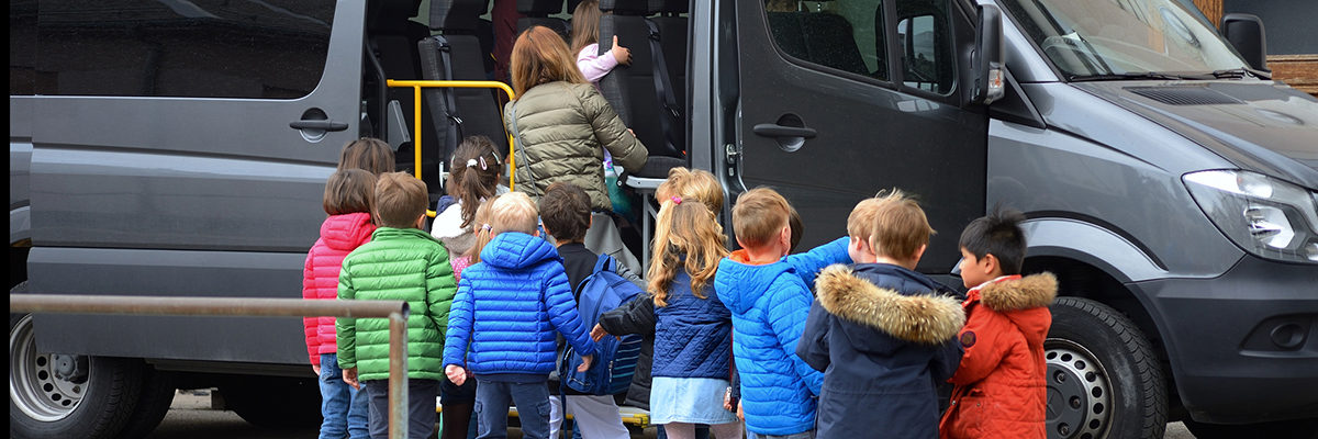 Minibus female teacher primary children