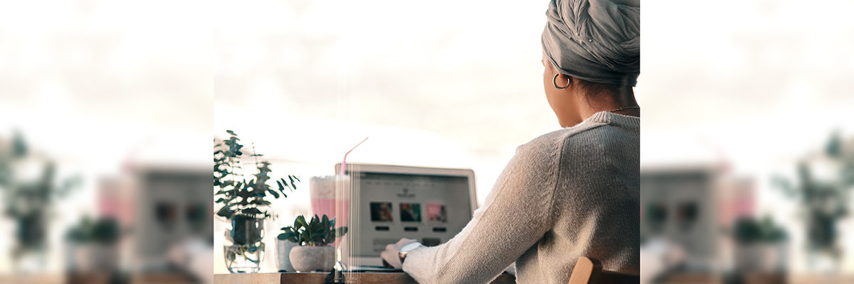 Young Asian female cafe laptop