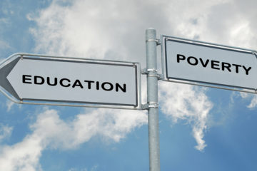 Poverty proofing education sign crossroad