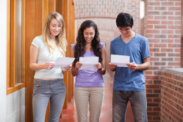 Exam results two girls one boy