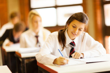 White secondary pupils taking exams