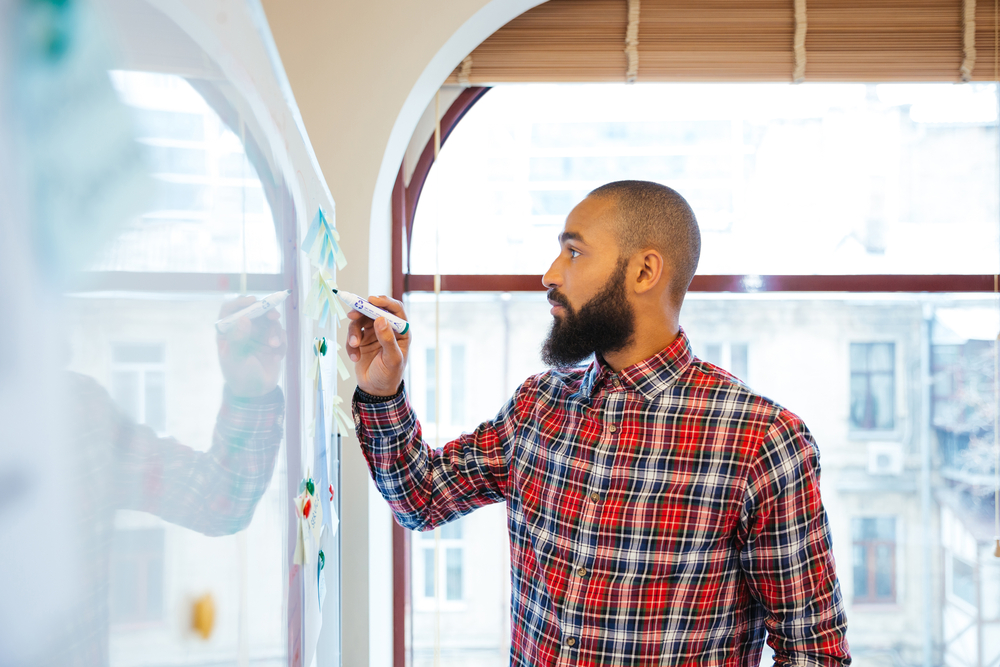 BME man using whiteboard
